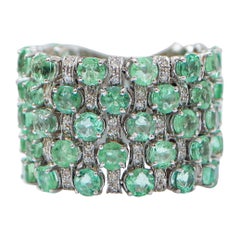 Retro Emeralds, Diamonds, 14 Karat White Gold Band Ring.