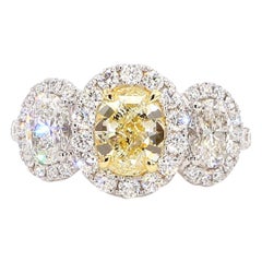GIA Certified Natural Yellow Oval Diamond 3.20 Carat TW Plat Cocktail Ring