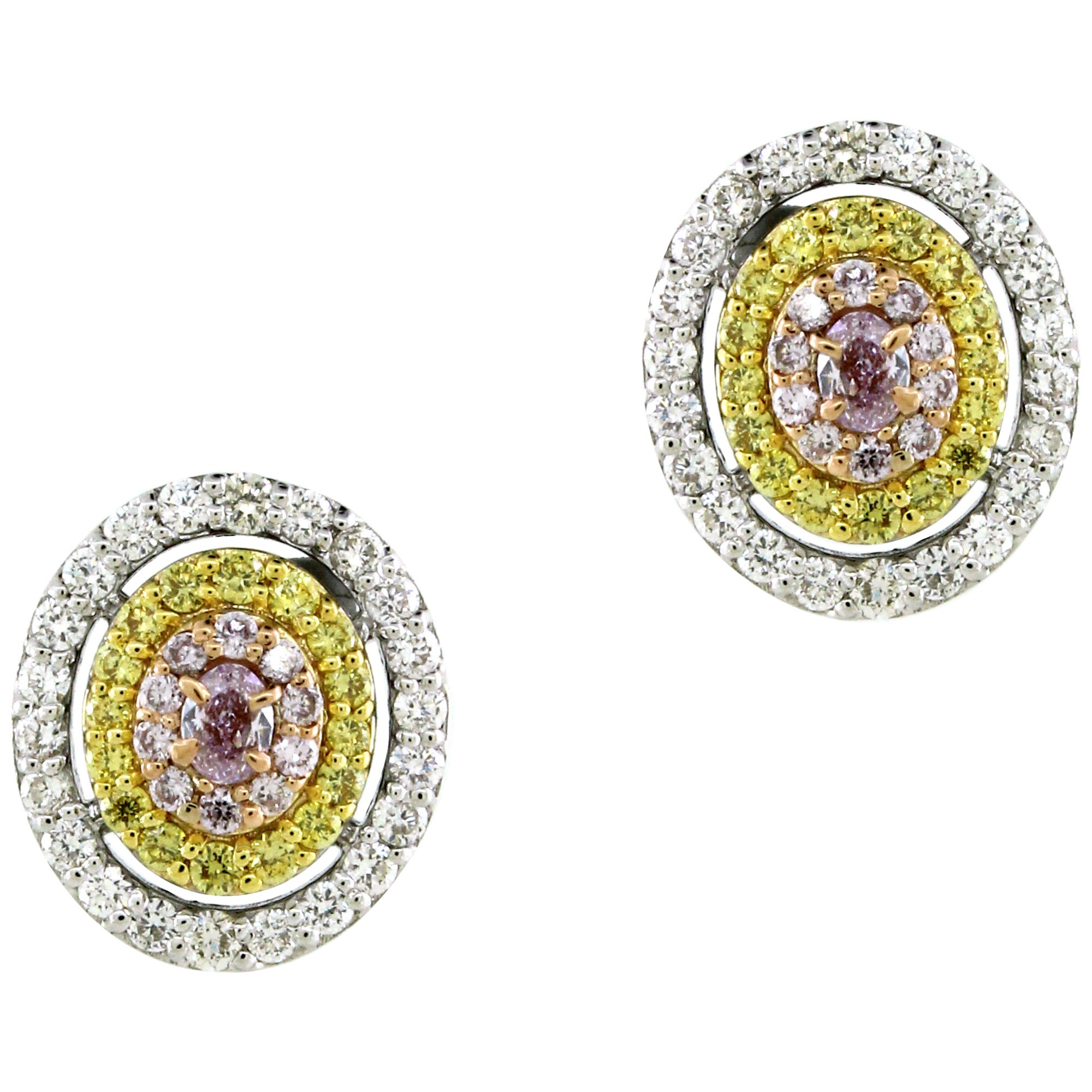 0.78 cts of Fancy Color Diamond Stud Earrings For Sale