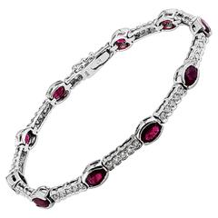6.28 Carats Oval Rubies Diamonds Gold Bracelet 7