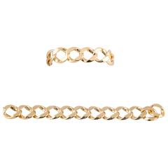 1980s Pair Of Curbed Interlocking Chic High Polish Gold Link Bracelets
