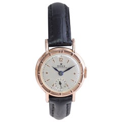 Rolex Montre Art déco en or rose et acier pour femmes de 1947