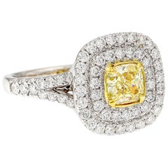 GIA Certified Fancy Intense Yellow Diamond 18 Karat White Gold Halo Ring