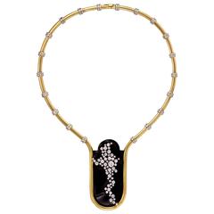 Gold necklace with abstract wood and diamond centerpiece 8