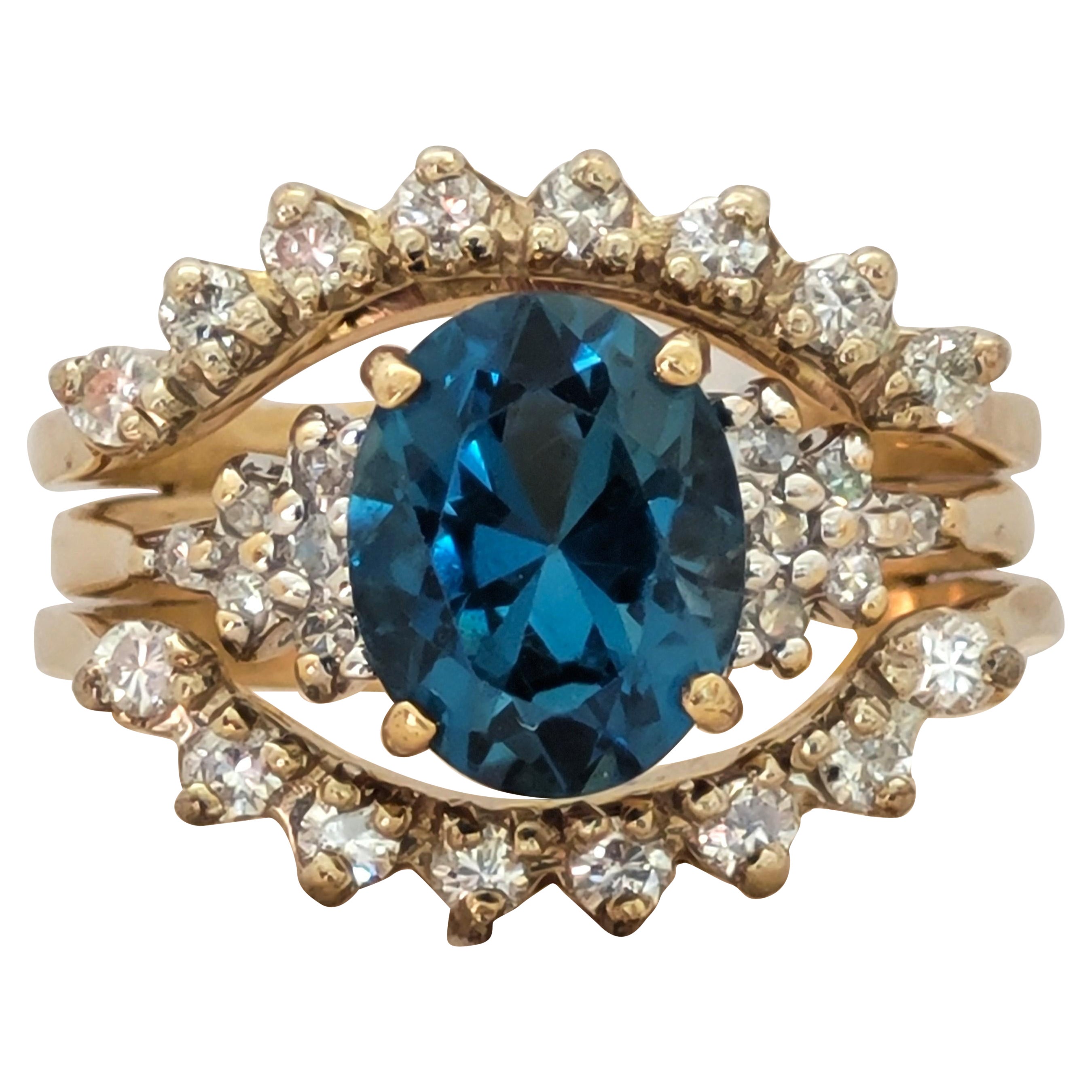 14kt Yellow Gold 9x7 Oval Blue Topaz .56ctttw Diamond Ring Wrap Size 6, 6.6 gr