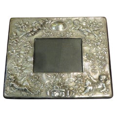 Used  Sterling Silver European Estate Rococo Hammered Frame with Cherubs