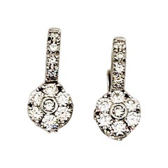 Boucles d'oreilles nonne en or blanc 18Kt et diamants