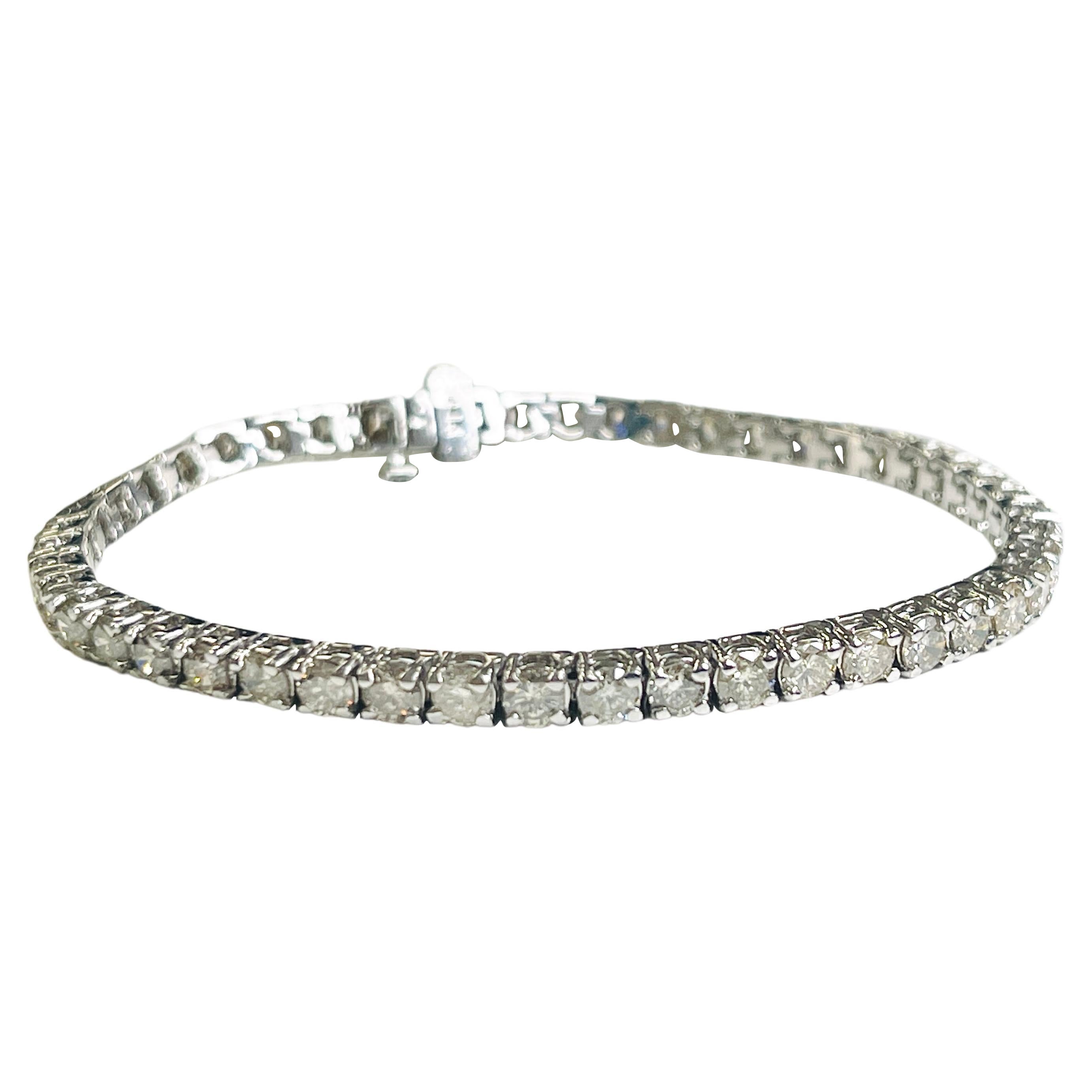 Bracelet tennis en or blanc 14 carats avec diamants de 7,38 carats