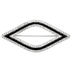Antica spilla Cartier in platino da 1,70 carati di onice nero e 2,20 carati di diamanti, CIRCA 1925