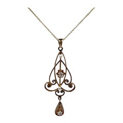 Pendentif Lavalier en or jaune avec perle ancienne et diamant 