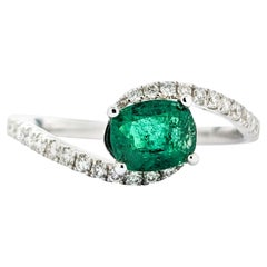Oval Emerald & Diamond Ring In White Gold