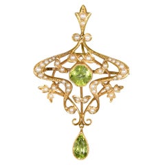 Pendentif/broche vintage en or jaune 15ct avec péridot et perles de rocaille