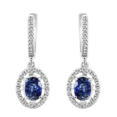 Zafiro azul ovalado y diamante blanco redondo Pendiente colgante de moda en oro de 18 quilates