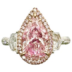 Pink Diamond Three-Stone Rings