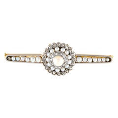 Broche de oro amarillo de 14 quilates con diamantes y perlas de collar
