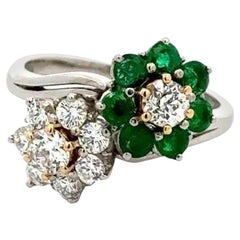 Anello Bypass in platino con diamante e smeraldo vintage