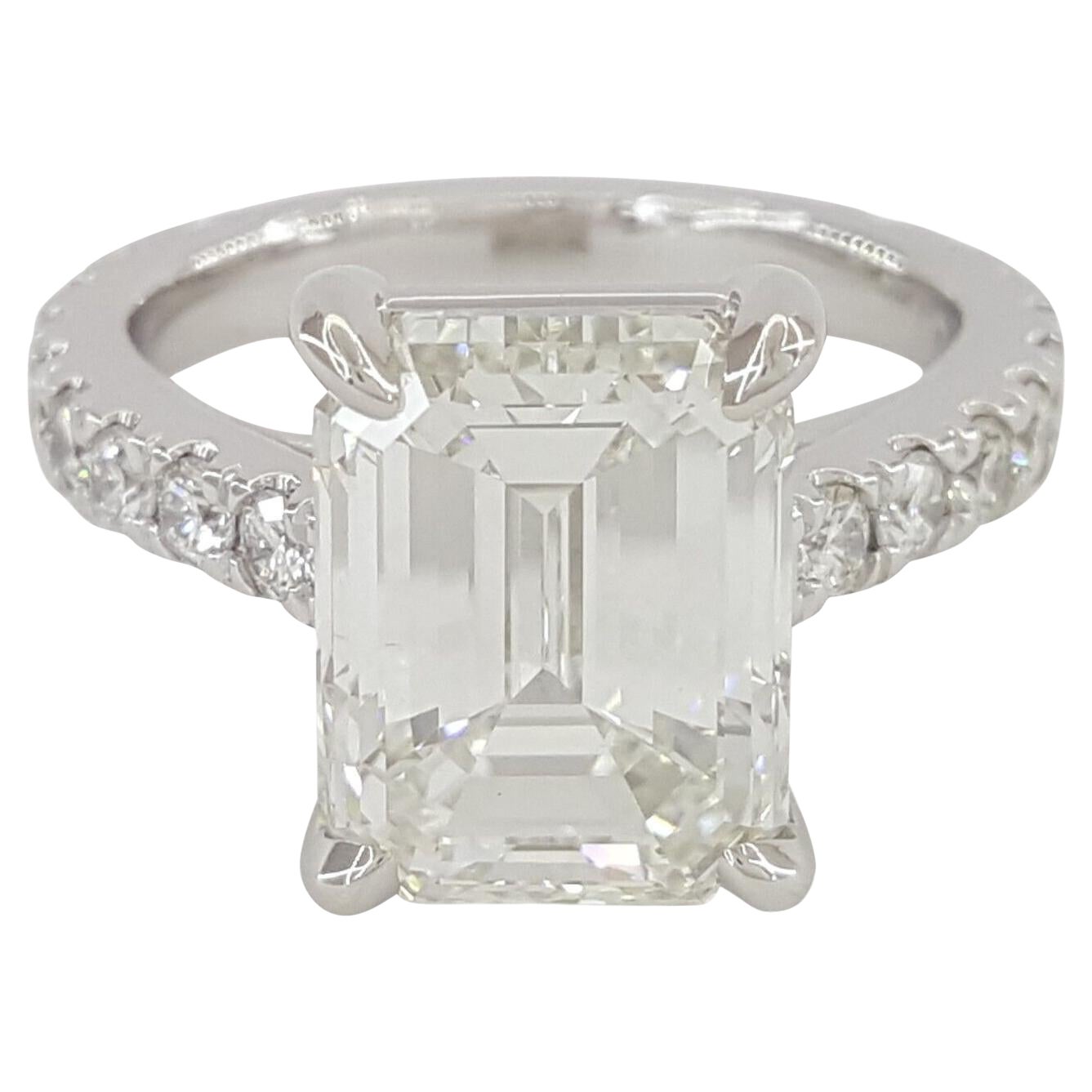 GIA Certified 4 Carat Emerald Cut Diamond Solitaire Ring with pavè