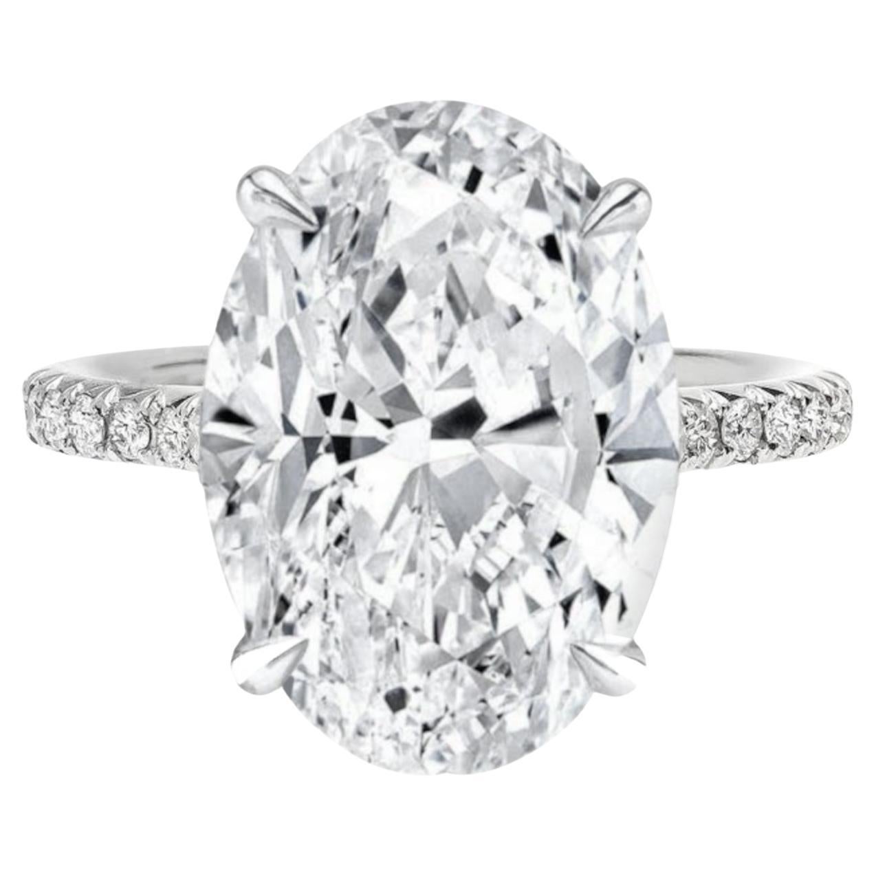 Exceptional GIA Certified 5.01 Carat Oval Diamond with Pavé Ring 