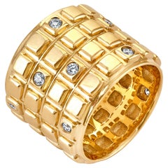 Bague barre chocolat en or jaune 18 carats et diamants