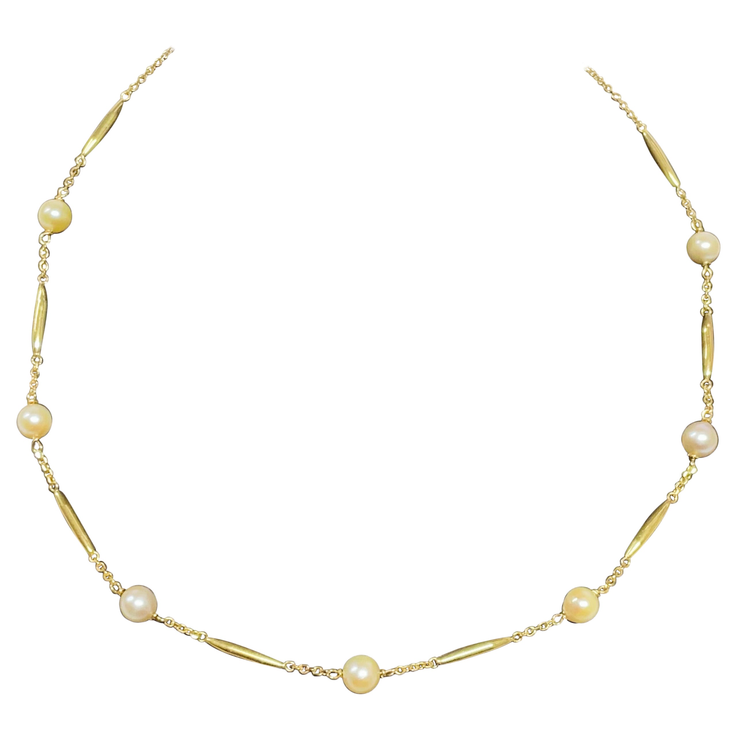 Yellow Gold Tubular Pearl Necklace For Sale