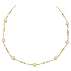 Yellow Gold Tubular Pearl Necklace