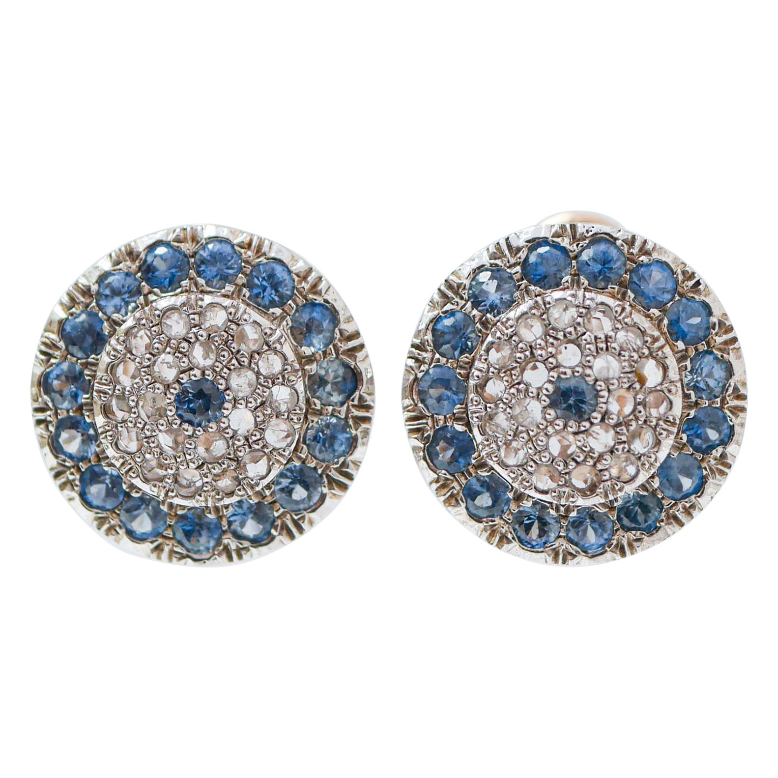 Pendientes de zafiros, diamantes, oro rosa y plata.