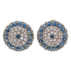 Pendientes de zafiros, diamantes, oro rosa y plata.