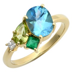 Natural Blue Topaz, Peridot, Emeralds, Diamond 2.07 cts TW set in 14KYG Ring