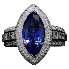 Meghna Jewels Anillo de oro de 18 quilates con diamante tanzanita azul talla marquesa de 2,60 quilates