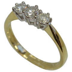 18 Karat Gelbgold Diamantring mit 3 Steinen