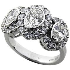 HRD Cert 0.80 Carat and 0.68 Oval Carat Cut Diamond Three Stone Ring 1
