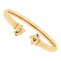 Cartier Panthere de Cartier Offenes Armband aus 18 Karat Gelbgold mit Tsavorit und Onyx 18