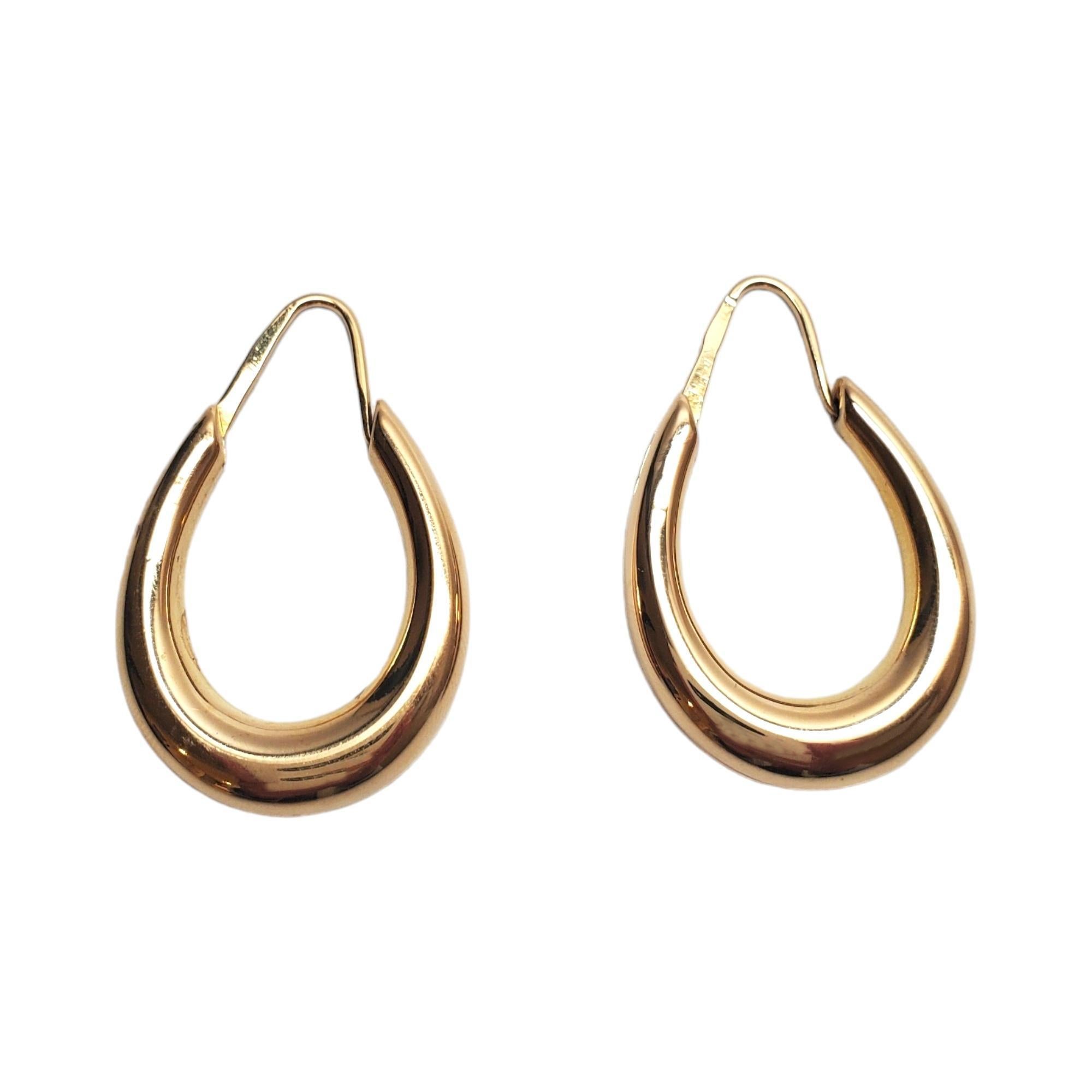18K Yellow Gold Oval Hoop Earrings #17864