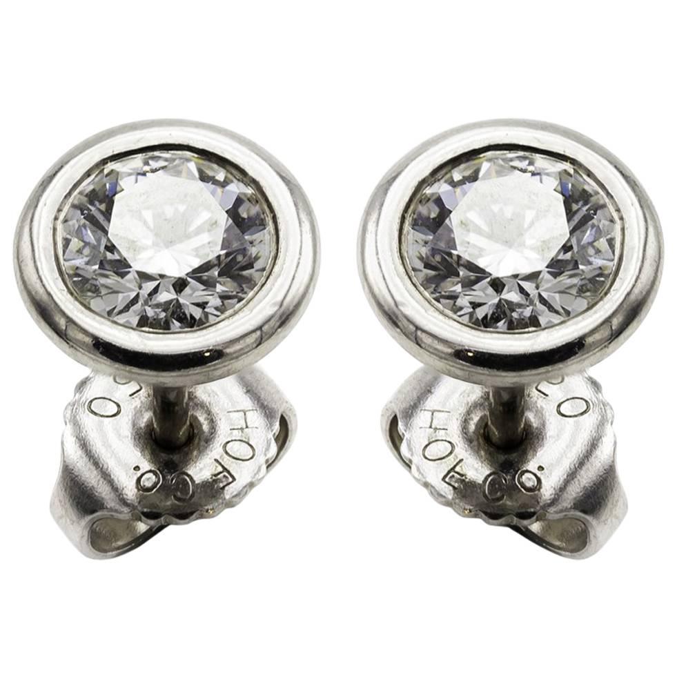 The sparkle is whats so amazing about these studs. The diamonds dance with light and luminosity and the size is perfect for any lady who wants this amazing sparkle on her ears. The setting is classic with a well balanced bezel and setting in