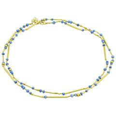 Faceted Turquoise Rondelle Bead and Yellow Gold Bead Long Necklace