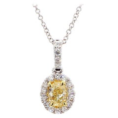 Colgante de gota de oro con diamante amarillo natural ovalado de 0.49 quilates TW