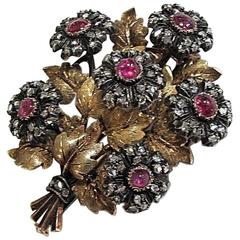 1940s Mario Buccellati ruby diamond silver gold floral brooch