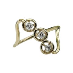 Alianza de 3 diamantes naturales en oro macizo de 14k