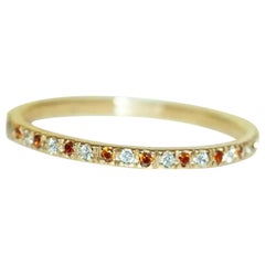 Eternity-Ring mit Granat und Diamant in 14 Karat Gold mit Mandarin- Spessartit
