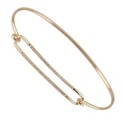 Bracciale Bangle con diamanti in oro giallo 14K