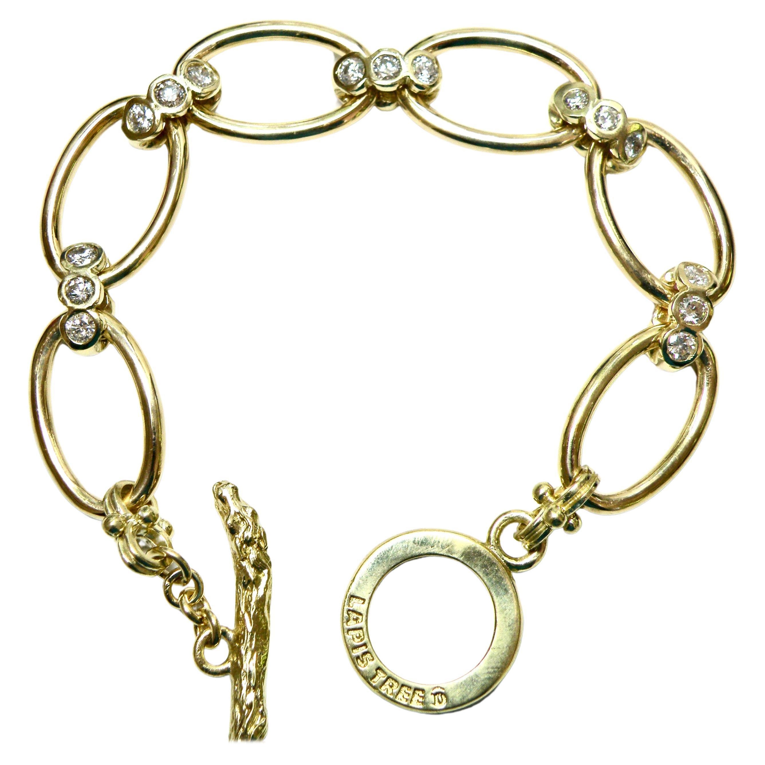 18k gold link bracelet w pink/white sapphire reversible links