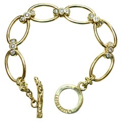 18k gold link bracelet w pink/white sapphire reversible links
