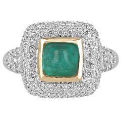 14K gold ring with a 2.54tcw natural sugarloaf cabochon cut emerald and diamond