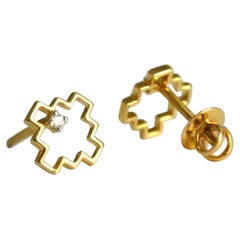 Clous d'oreilles géométriques en or 14k