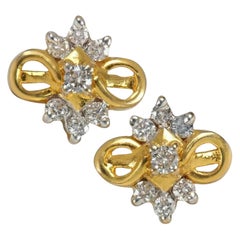Orecchini Infinity con diamante e disegno floreale in oro giallo massiccio 14 carati