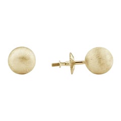 Orecchino rotondo con borchie in oro rosa massiccio 14k
