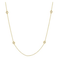Collana a catena con charm quadruplo di diamanti in oro massiccio 14K