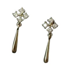 Pendiente gota copo de nieve europeo simple de oro macizo de 14 quilates Diamante natural