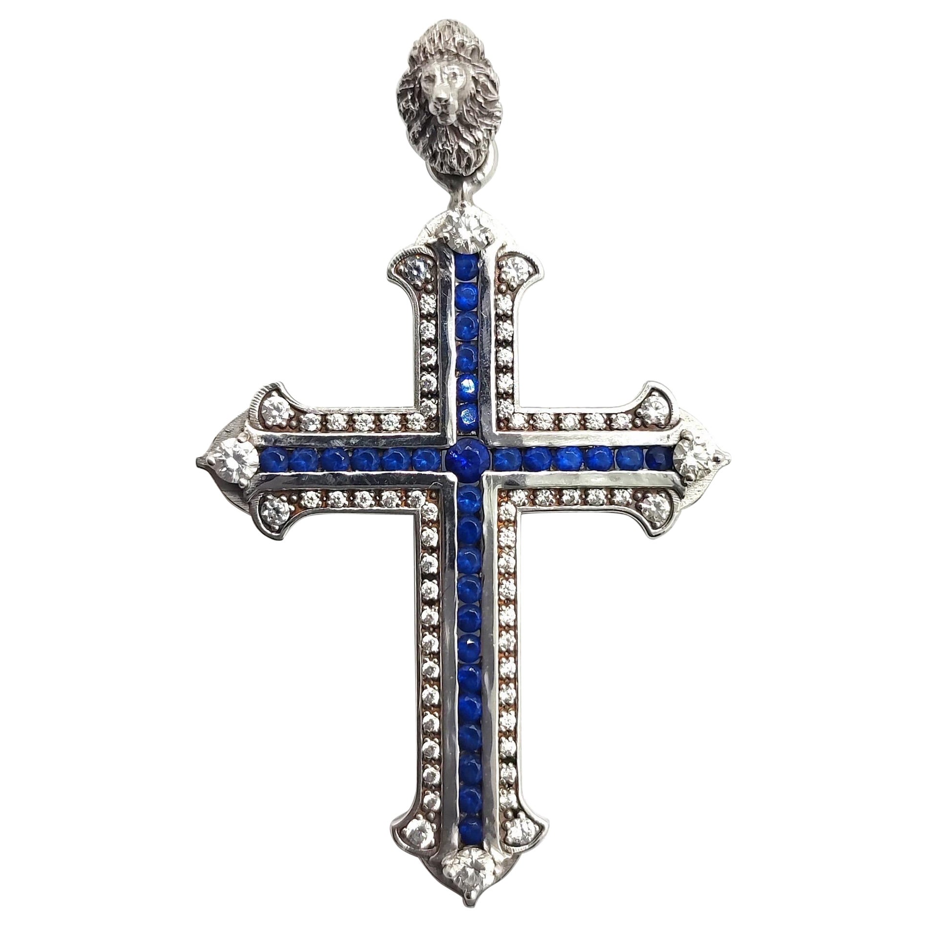 Croce diamanti zaffiri oro bianco 18 kt