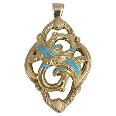 Victorian Gold Tone Light Blue Enamel Knot Motif Pendant Necklace
